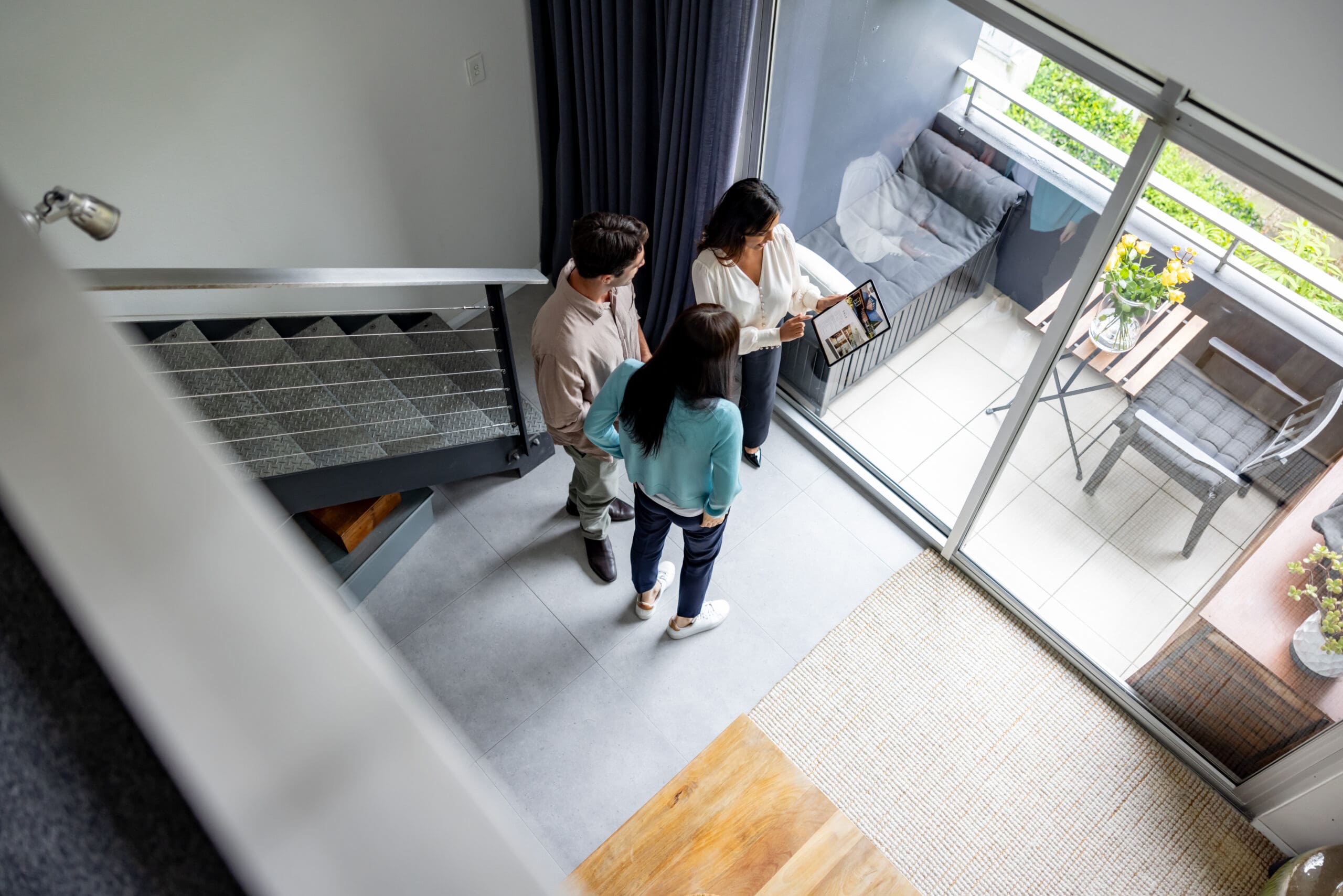 Couple viewing modern apartment interior